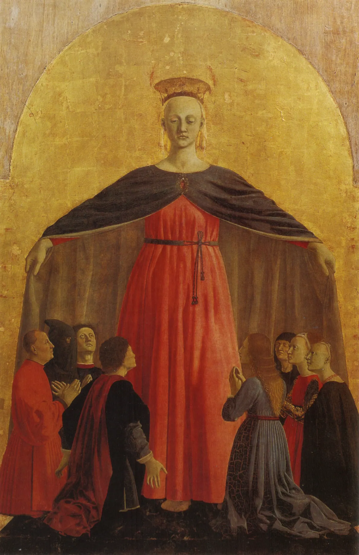 La Virgen cobija bajo su amplio manto a fieles arrodillados, Madonna della Misericordia de Piero della Francesca